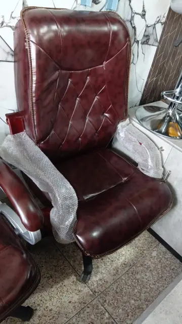 Executive chair re-covered in maroon leather