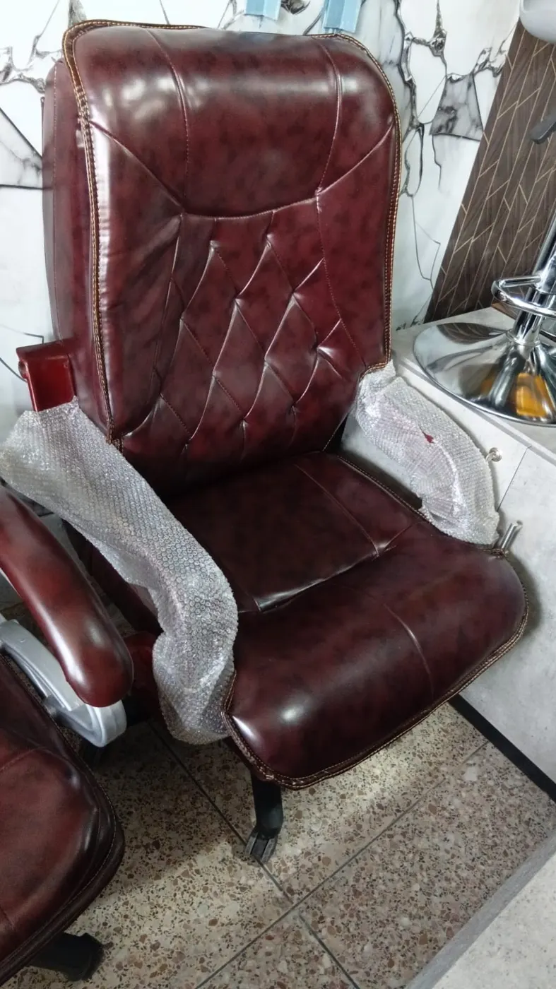 Executive office chair re-upholstered in maroon leather