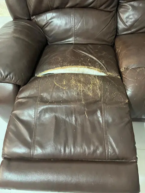 Peeling leather recliner before repair